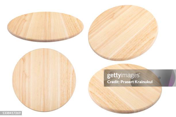 round cutting board on a white background - round wooden chopping board stock pictures, royalty-free photos & images