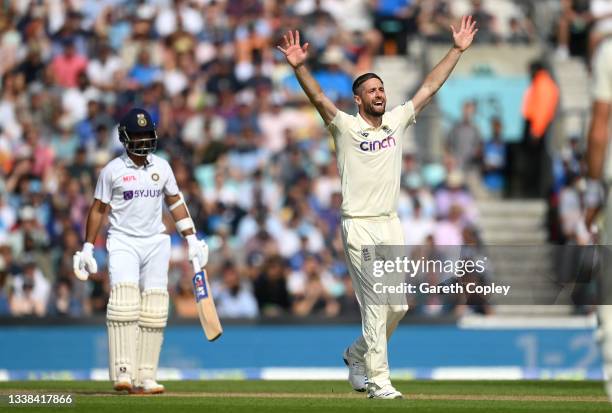 Chris Woakes of England successfully appeals for the wicket of Ajinkya Rahane of India during day four of the Fourth LV= Insurance Test Match between...