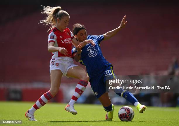 Sam Kerr of Chelsea is challenged by Leah Williamson of Arsenal FC during the Barclays FA Women's Super League match between Arsenal Women and...