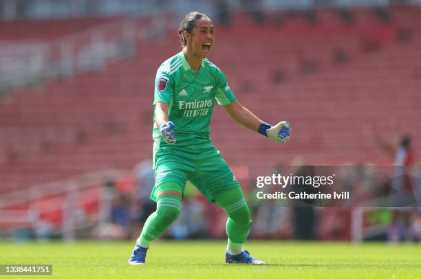 Manuela Zingsberger of Arsenal FC celebrates their sides third goal during the Barclays FA Women's Super League match between Arsenal Women and...