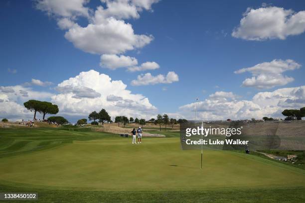 General view as Tommy Fleetwood of England lines up a putt on the 7th green during Day Four of The Italian Open at Marco Simone Golf Club on...