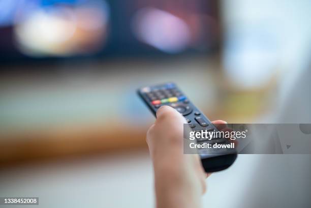 remote control with tv - television industry stockfoto's en -beelden