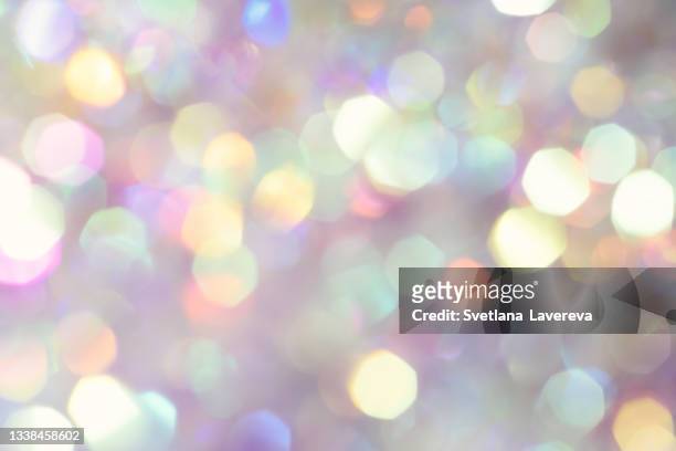 abstract blurred rainbow glitter background. bright and colorful background. - raggiante foto e immagini stock