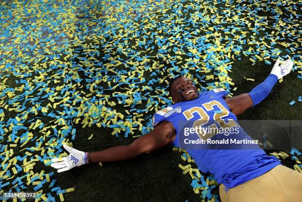 Obi Eboh of the UCLA Bruins celebrates after a win against the LSU Tigers at Rose Bowl on September 04, 2021 in Pasadena, California.