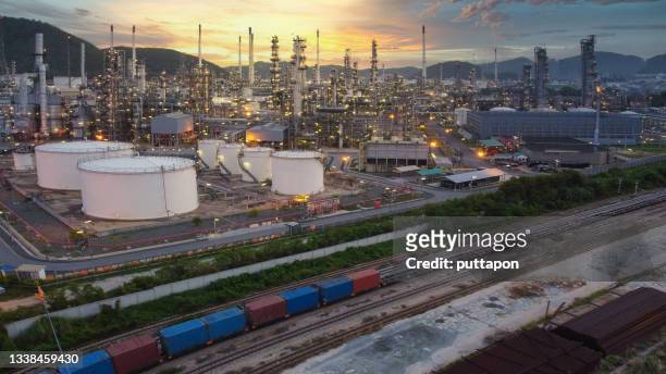 aerial view of the landscape of the refinery with beautiful lighting at sunrise times, refinary plant with oil tank storage, petrochemical plant - gas works stock pictures, royalty-free photos & images