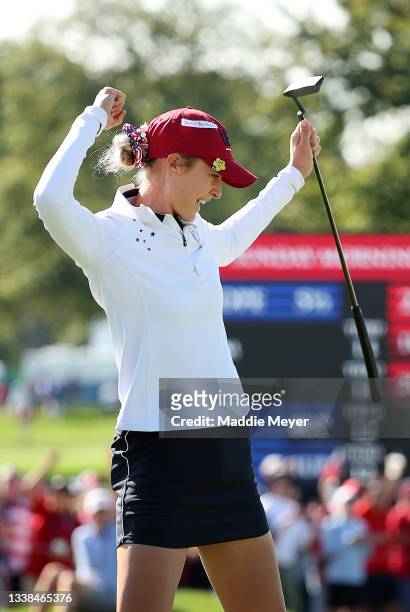 Nelly Korda of Team USA celebrates on the 13th green after her putt during the Foursomes Match on day two of the Solheim Cup at the Inverness Club on...