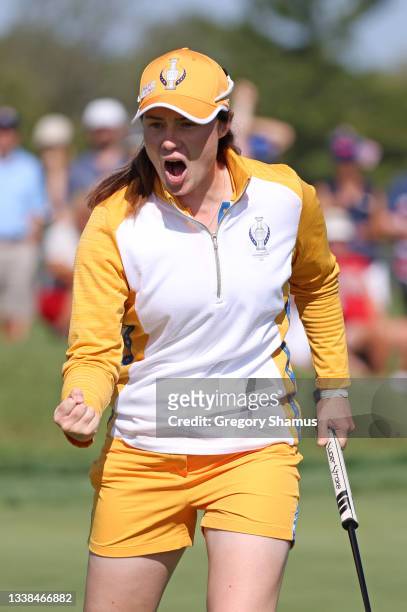 Leona Maguire of Team Europe reacts to her putt on the 14th green during the Foursomes Match on day two of the Solheim Cup at the Inverness Club on...
