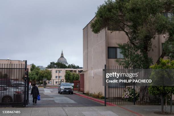 The San Francisco City Hall rotunda looms behind the Freedom House low-income affordable housing in the Fillmore district of San Francisco,...