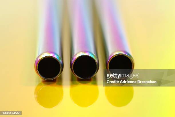 three titanium pipes - alloy stockfoto's en -beelden