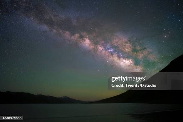 night sky milky way rise over pangong lake in ladakh india - ladakh region stock pictures, royalty-free photos & images