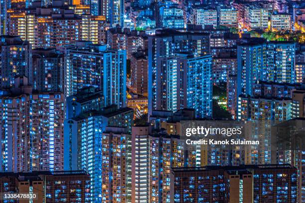 skyscrapers at night, hong kong skyline - construction lighting equipment stock pictures, royalty-free photos & images