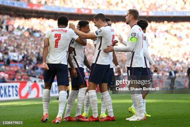 Jesse Lingard of England celebrates with Conor Coady after scoring their team's first goal during the 2022 FIFA World Cup Qualifier match between...