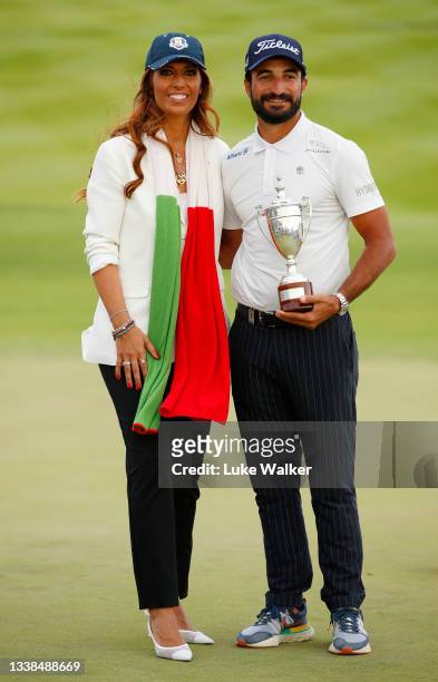 Francesco Laporta of Italy poses for a photo with Lavinia Biagiotti and his trophy for being the leading Italian player after Day Four of The Italian...