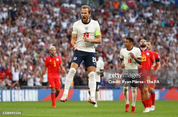 Harry Kane of England celebrates after scoring their team's second goal from the penalty spot during the 2022 FIFA World Cup Qualifier match between...