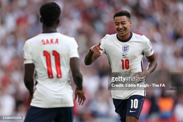 Jesse Lingard of England celebrates after scoring their team's third goal during the 2022 FIFA World Cup Qualifier match between England and Andorra...
