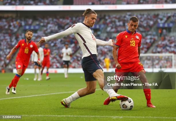 Jack Grealish of England is put under pressure by Chus Rubio of Andorra during the 2022 FIFA World Cup Qualifier match between England and Andorra at...