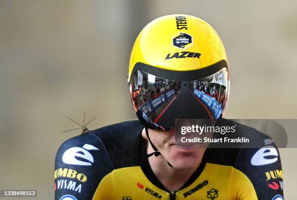 Steven Kruijswijk of Netherlands and Team Jumbo - Visma and a dragonfly perched on its shoulder cross the finishing line during the 76th Tour of...