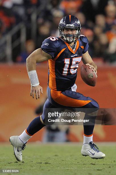 Quarterback Tim Tebow of the Denver Broncos scrambles against the New York Jets at Sports Authority Field at Mile High on November 17, 2011 in...