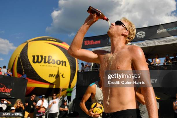 Chase Budinger celebrates after defeating Tri Bourne and Trevor Crabb during the AVP Gold Series Chicago Open at the Oak Street Beach on September...