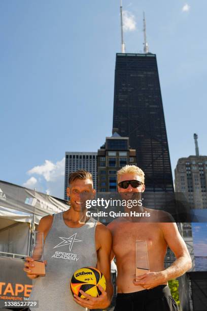 Chase Budinger and Casey Patterson celebrate after defeating Tri Bourne and Trevor Crabb during the AVP Gold Series Chicago Open at the Oak Street...
