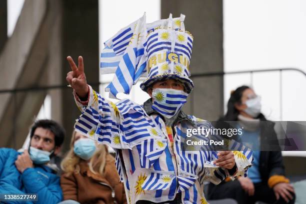 Fan of Uruguay wearing a costume with flags of Uruguay prior to a match between Uruguay and Bolivia as part of South American Qualifiers for Qatar...