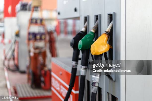 gas station work - gas pump bildbanksfoton och bilder