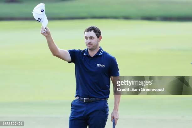 Patrick Cantlay of the United States celebrates on the 18th green after winning during the final round of the TOUR Championship at East Lake Golf...