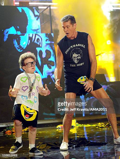 Keenan Cahill and singer/actor David Hasselhoff performs with LMFAO onstage at the 2011 American Music Awards held at Nokia Theatre L.A. LIVE on...
