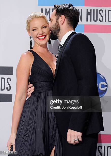 Actress Katherine Heigl and husband recording artist Josh Kelley pose at the 2011 American Music Awards Press Room at Nokia Theatre L.A. Live on...