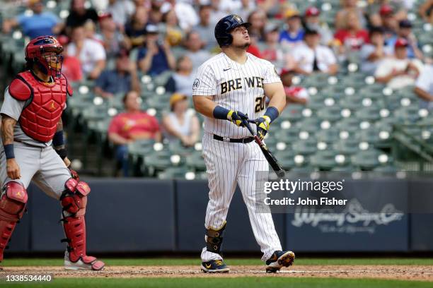 Daniel Vogelbach of the Milwaukee Brewers hits a walk-off grand slam in the ninth inning against the St. Louis Cardinals at American Family Field on...