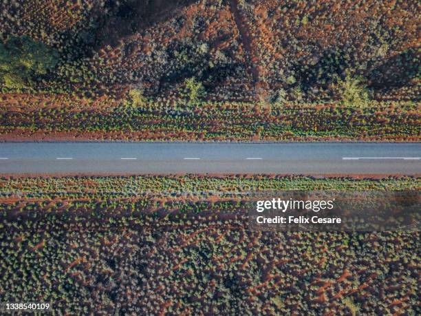 aerial view of an empty deserted road - western australia road stock pictures, royalty-free photos & images