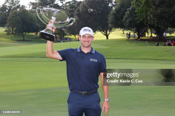 Patrick Cantlay of the United States celebrates with the FedEx Cup after winning during the final round of the TOUR Championship at East Lake Golf...