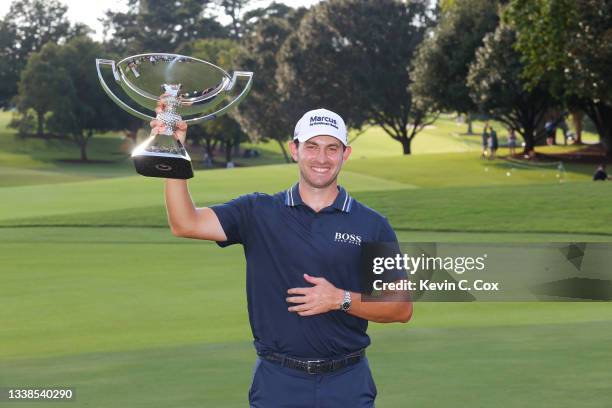 Patrick Cantlay of the United States celebrates with the FedEx Cup after winning during the final round of the TOUR Championship at East Lake Golf...