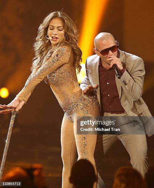 Jennifer Lopez and Pitbull perform onstage at the 2011 American Music Awards held at Nokia Theatre L.A. Live on November 20, 2011 in Los Angeles,...