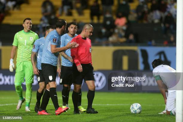 Diego Godin of Uruguay reacts to Referee Ubaldo Aquino during a match between Uruguay and Bolivia as part of South American Qualifiers for Qatar 2022...