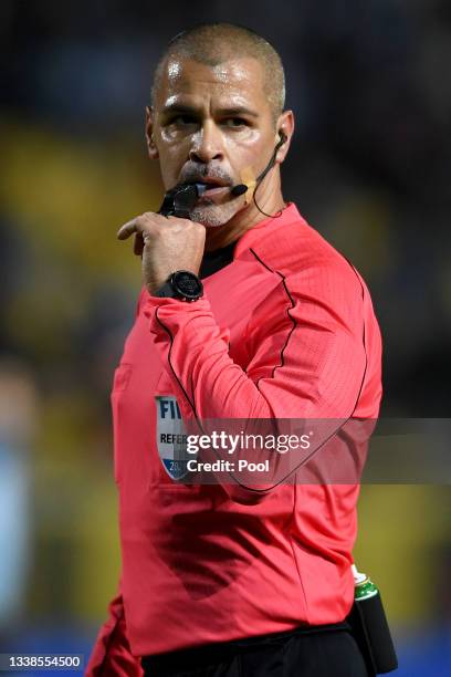 Referee Eber Aquino reacts during a match between Uruguay and Bolivia as part of South American Qualifiers for Qatar 2022 at Campeon del Siglo...