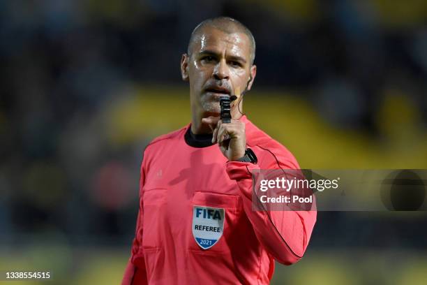 Referee Eber Aquino reacts during a match between Uruguay and Bolivia as part of South American Qualifiers for Qatar 2022 at Campeon del Siglo...