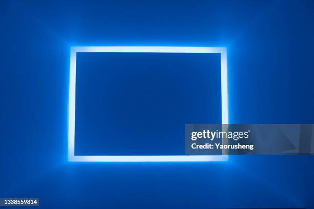 abstract blue square glowing lighting wall,blurry people in motion - 四角形 ストックフォトと画像