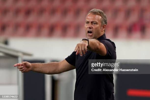 Hans-Dieter Flick, head coach of Germany reacts during the 2022 FIFA World Cup Qualifier match between Germany and Armenia at Mercedes-Benz Arena on...