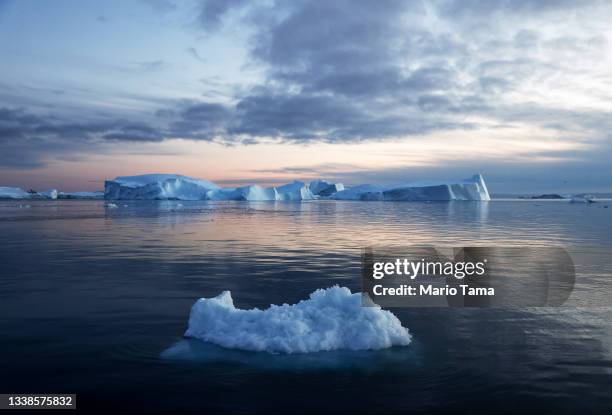 Icebergs which calved from the Sermeq Kujalleq glacier float in the Ilulissat Icefjord on September 05, 2021 in Ilulissat, Greenland. 2021 will mark...