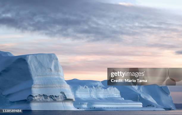 Icebergs which calved from the Sermeq Kujalleq glacier float in the Ilulissat Icefjord on September 05, 2021 in Ilulissat, Greenland. 2021 will mark...