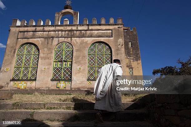 Priest on his way to the St. Mary Church of Zion in Aksum on January 25, 2011 in Aksum, Ethiopia.