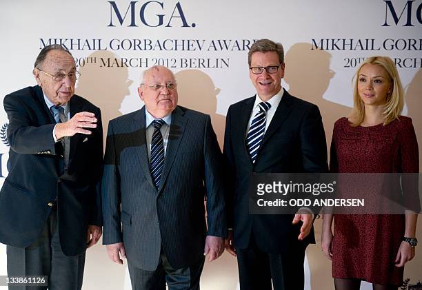 Former Soviet Union President Mikhail Gorbachev , his grand daughter Ksenia Gorbacheva , German foreign minister Guido Westerwelle and former German...