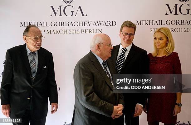 Former Soviet Union President Mikhail Gorbachev , his grand daughter Ksenia Gorbacheva , German foreign minister Guido Westerwelle and former German...