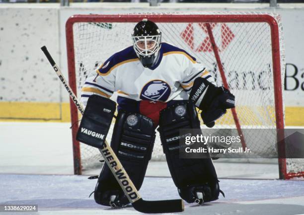 John Blue, Goaltender for the Buffalo Sabres looks on from in front of the goal post during the NHL Eastern Conference Northeast Division game...