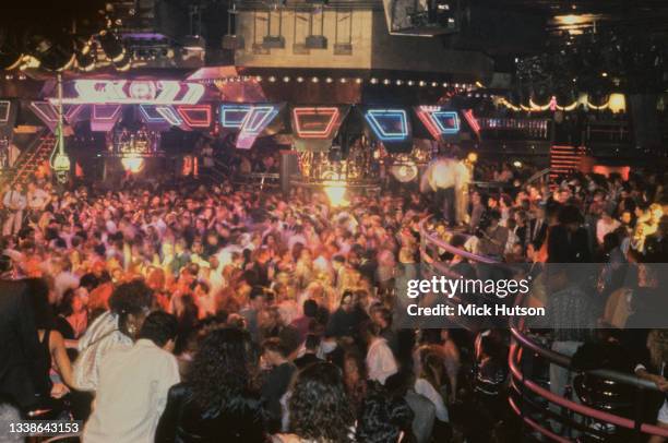 Clubbers at the Hammersmith Palais nightclub, London, UK, circa 1990.