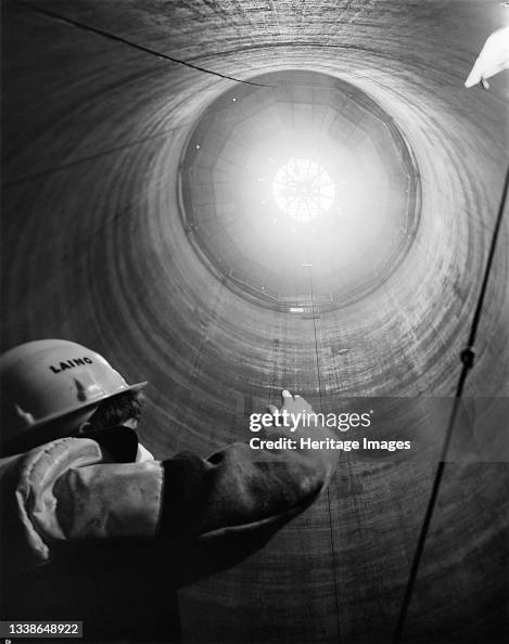 An interior view looking up towards the partially completed conical ...