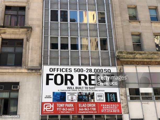 For Rent, will built to suit sign on commercial office building, Midtown Manhattan, New York.