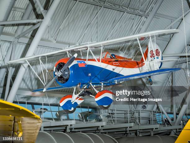 Three-place, open-cockpit biplane with red, white and blue paint scheme. Wright J-6-7 , 240 hp engine. From 1931 to 1953, Andy Stinis performed...