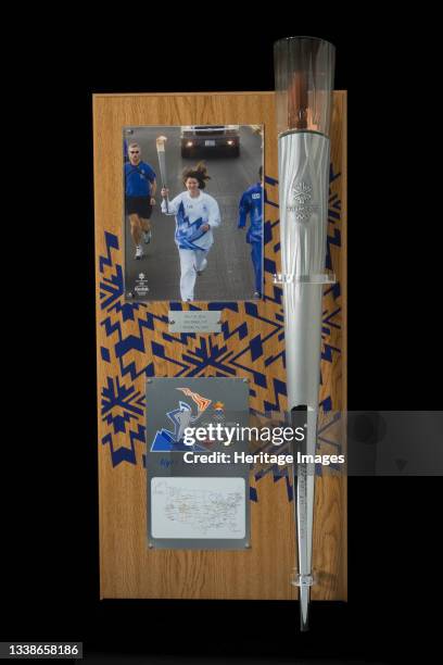 Olympic torch carried by Sally Ride, 2002. This torch and accompanying plaque are from Dr. Sally K. Ride's participation in the 2002 Olympic Torch...